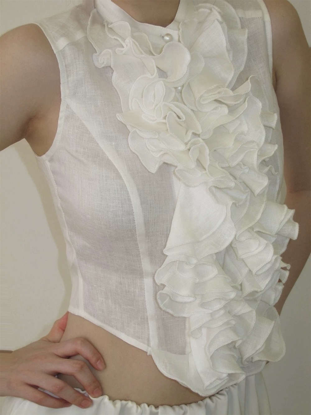 White Ruffled Sleeveless Blouse